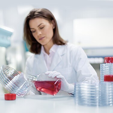 save-incubator-space-round-multilayer-devices-19-0729 A scientist uses Round Multilayer Devices for more efficient storage